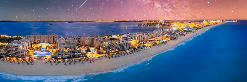 Cancun hotel zone aerial view at night with stars